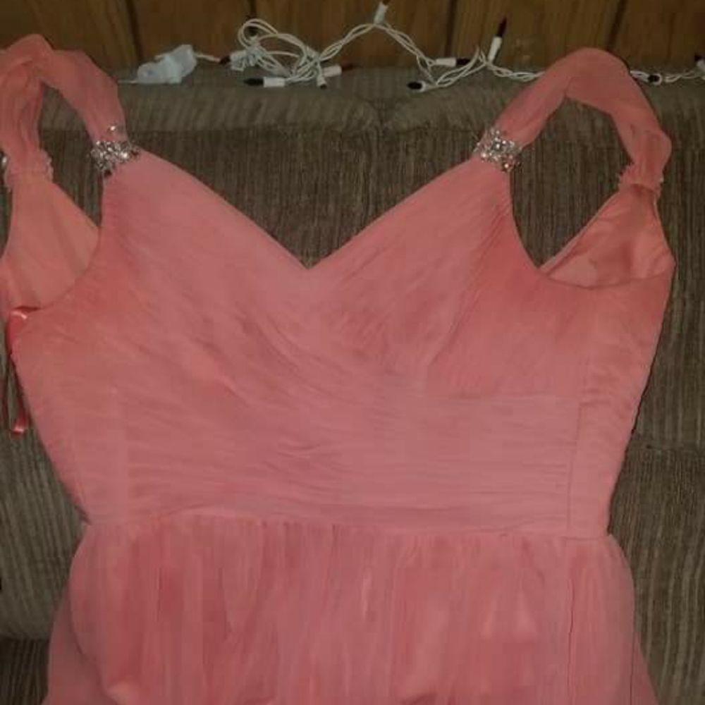 Long peach dress.